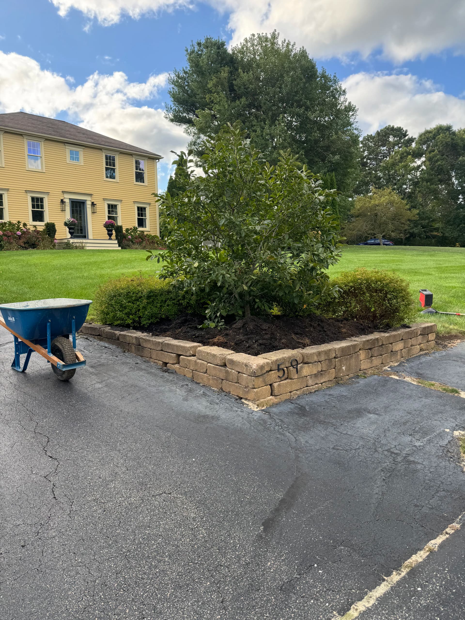 Old Retaining Wall Out, Unilock Brussel Block In