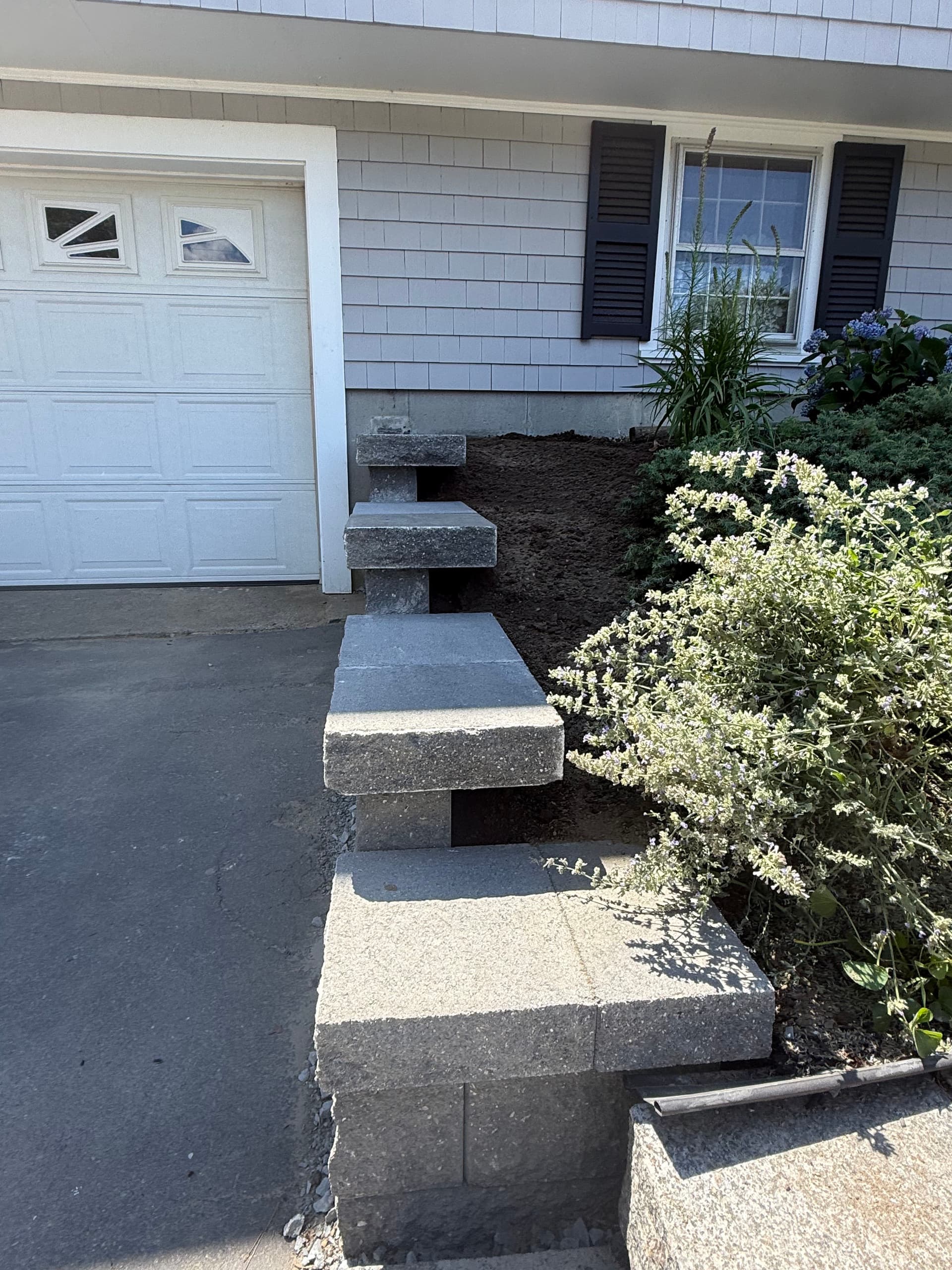 Gallery photos for Two Driveway Retaining Walls Replaced with Solid Block Construction: Image #2
